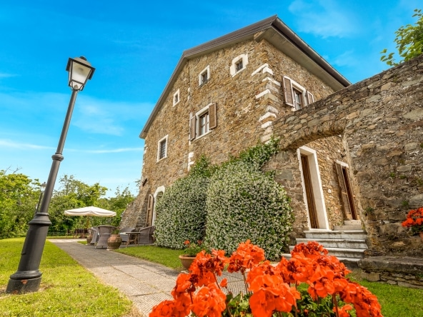 Stone arches and architectural details of the villa’s exterior