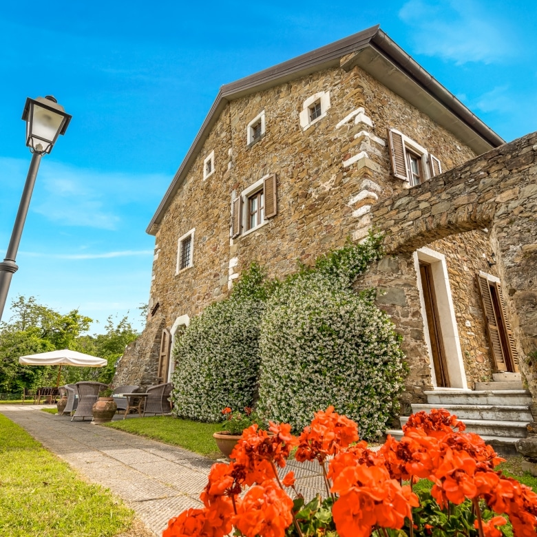 Stone arches and architectural details of the villa’s exterior