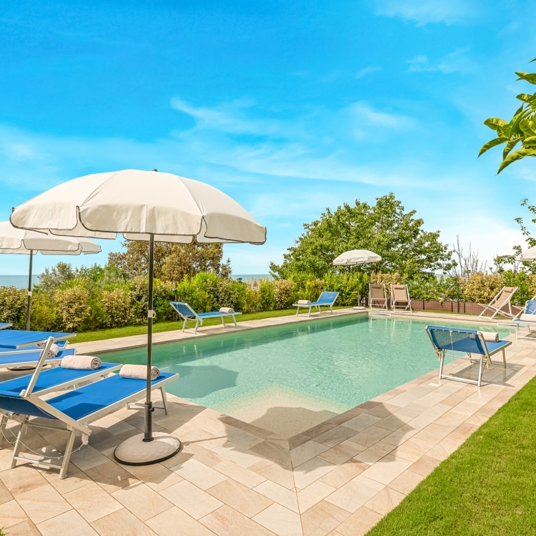 anoramic swimming pool with sea and countryside views